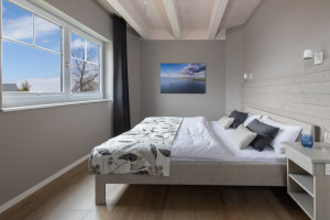 Schlafzimmer im Erdgeschoss - © Resort Stettiner Haff GmbH